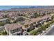 Aerial view featuring the homes with mountain views in the distance at 10116 Skye Castle Dr, Las Vegas, NV 89166