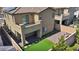 Aerial view of the backyard, complete with a putting green and a cozy fire pit at 10116 Skye Castle Dr, Las Vegas, NV 89166