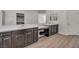 Elegant bathroom with dual vanities, a makeup vanity, and modern fixtures at 10116 Skye Castle Dr, Las Vegas, NV 89166
