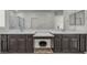 Bathroom with double sinks, vanity, and mirrors at 10116 Skye Castle Dr, Las Vegas, NV 89166