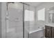 Bathroom featuring a separate shower and soaking tub with white subway tile at 10116 Skye Castle Dr, Las Vegas, NV 89166