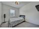 Bedroom featuring a comfortable bed and a window that provides plenty of natural light at 10116 Skye Castle Dr, Las Vegas, NV 89166
