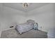 Comfortable bedroom with carpet flooring and a window that provides plenty of natural light at 10116 Skye Castle Dr, Las Vegas, NV 89166