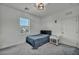 Bedroom featuring a comfortable bed and a window that provides plenty of natural light at 10116 Skye Castle Dr, Las Vegas, NV 89166