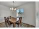 Cozy dining area with wood floors and bright natural light at 10116 Skye Castle Dr, Las Vegas, NV 89166
