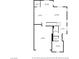 First floor layout featuring a kitchen, living room, dining area, and garage at 10116 Skye Castle Dr, Las Vegas, NV 89166