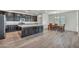Spacious kitchen flows into the dining area with hardwood floors at 10116 Skye Castle Dr, Las Vegas, NV 89166
