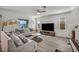 Bright living room includes hardwood floors and ample natural light at 10116 Skye Castle Dr, Las Vegas, NV 89166