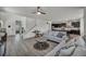 Open concept living room boasts hardwood floors and flows into the kitchen area at 10116 Skye Castle Dr, Las Vegas, NV 89166