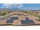 The roof of a home adorned with solar panels, enhancing its energy efficiency at 10116 Skye Castle Dr, Las Vegas, NV 89166