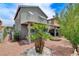 Backyard featuring desert landscaping, a covered patio, and rock features at 1017 Pebble Lake St, Henderson, NV 89011