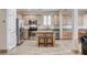 Open kitchen showcases granite counters, stainless steel appliances, and island seating at 1017 Pebble Lake St, Henderson, NV 89011