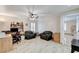 Loft featuring a ceiling fan, and an adjacent doorway leading to another room at 1017 Pebble Lake St, Henderson, NV 89011