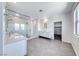 Bright bathroom with a double vanity, walk-in shower, and walk-in closet at 1038 Delbrook Ave, Henderson, NV 89012