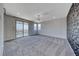 Spacious bedroom with walk out balcony and stylish accent wall at 1038 Delbrook Ave, Henderson, NV 89012
