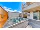 The modern hot tub in the backyard is perfect for relaxing and enjoying outdoor living at 1038 Delbrook Ave, Henderson, NV 89012