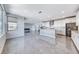 Bright kitchen with stainless steel appliances, an island with seating, and a modern backsplash at 1038 Delbrook Ave, Henderson, NV 89012