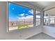 Bright Living Area with large windows offering views of the valley at 1038 Delbrook Ave, Henderson, NV 89012