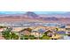 Neighborhood street view featuring well-maintained homes with desert landscaping and solar panels at 1038 Delbrook Ave, Henderson, NV 89012