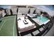 Aerial view of backyard, featuring a pool, spa, outdoor kitchen, seating area, and sport court at 11912 Skyline Arch Ct, Las Vegas, NV 89138