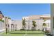 Outdoor tennis and basketball court with a seating area and grill at 11912 Skyline Arch Ct, Las Vegas, NV 89138