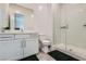 Modern bathroom featuring a glass shower, sleek vanity, and dark mats at 11912 Skyline Arch Ct, Las Vegas, NV 89138