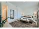 Bright bedroom with neutral tones, stylish furnishings, and lots of natural light at 11912 Skyline Arch Ct, Las Vegas, NV 89138