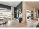 Spacious dining room with seamless indoor-outdoor flow and modern decor at 11912 Skyline Arch Ct, Las Vegas, NV 89138