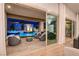 Beautiful outdoor patio with a modern pool and comfortable seating area at 11912 Skyline Arch Ct, Las Vegas, NV 89138