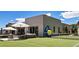 Outdoor tennis court featuring a patio area with outdoor furniture and a glimpse of the backyard at 11912 Skyline Arch Ct, Las Vegas, NV 89138