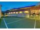 This property includes a full-sized, private tennis court with professional lighting for evening play at 11912 Skyline Arch Ct, Las Vegas, NV 89138