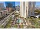 Upscale resort with a pool, palm trees, and city views in an urban setting at 135 E Harmon Ave # 3816, Las Vegas, NV 89109