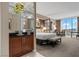 Bedroom view featuring city views and a convenient kitchenette at 135 E Harmon Ave # 3816, Las Vegas, NV 89109