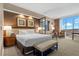 Bright bedroom featuring a king bed and floor-to-ceiling windows at 135 E Harmon Ave # 3816, Las Vegas, NV 89109