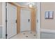 Hallway showing unit number and a glimpse of tiled flooring and neutral wall tones at 135 E Harmon Ave # 3816, Las Vegas, NV 89109