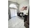 Elegant dining area featuring bright lighting, modern table, and decorative artwork at 1505 Lilac Breeze Cir, Las Vegas, NV 89108