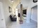 Spacious living room with a column accent, marble flooring, and comfortable seating at 1505 Lilac Breeze Cir, Las Vegas, NV 89108