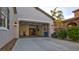 Spacious three-car garage with ample parking and storage space, including a convenient side entrance at 1869 Bronze Patina St, Henderson, NV 89044