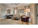 Spacious living room showcasing stylish furnishings, a neutral color palette, and ample natural light for a relaxing ambiance at 1869 Bronze Patina St, Henderson, NV 89044