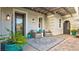 Charming patio area with stylish seating, lush greenery, and an inviting atmosphere to relax outdoors at 1869 Bronze Patina St, Henderson, NV 89044