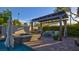 Serene pool and patio area with pergola, perfect for relaxing and entertaining friends and Gathering at 1869 Bronze Patina St, Henderson, NV 89044