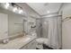 Bathroom featuring granite countertops, a walk-in shower, and a modern vanity at 2451 N Rainbow Blvd # 2076, Las Vegas, NV 89108