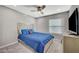 Cozy bedroom featuring plush carpeting and a comfortable bed with a ceiling fan at 2451 N Rainbow Blvd # 2076, Las Vegas, NV 89108