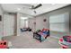 bedroom with a large mirrored closet and gray carpet at 2451 N Rainbow Blvd # 2076, Las Vegas, NV 89108