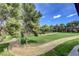 Expansive green space with mature trees and walking paths, offering a serene outdoor environment at 2451 N Rainbow Blvd # 2076, Las Vegas, NV 89108