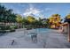 Community pool area with a hot tub, offering residents a relaxing space to enjoy the outdoors at 2451 N Rainbow Blvd # 2076, Las Vegas, NV 89108