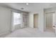Bedroom featuring plush carpeting, neutral walls, a window, closet with sliding doors, and a mirror at 2586 Begonia Valley Ave, Henderson, NV 89074
