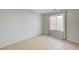 Bedroom features tile floors and window for natural light at 2586 Begonia Valley Ave, Henderson, NV 89074