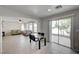 Inviting dining area connects to a bright living room and features sliding glass doors to the outdoor space at 2586 Begonia Valley Ave, Henderson, NV 89074