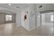 Bright entryway with tiled floor and staircase to upper level at 2586 Begonia Valley Ave, Henderson, NV 89074